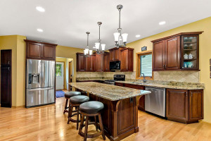 Photo for 3600 Alvarado Lane N, Plymouth, MN 55446 - Listing #6014595 The cooks in the family will love sharing their craft in this updated kitchen with cherry cabinetry, granite countertops, hardwood floors and stainless steel appliances.