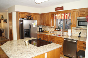 Photo for 706 8th Avenue NW, Austin, MN 55912 - Listing #6096587 Kitchen has stainless steel appliances and center island