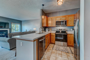 Photo for 6772 Pine Crest Trail S, Cottage Grove, MN 55016 - Listing #6084124 Kitchen features brand new stainsless steel appliances.