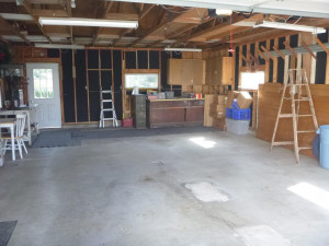 Photo for 21 1st Street SE, Altura, MN 55910 - Listing #6110587 Garage interior with access door to backyard