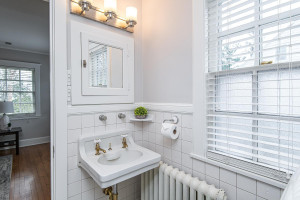 Photo for 615 8th Avenue SW, Rochester, MN 55902 - Listing #5748504 Pass-through bath between master and second bedroom with tile surround.