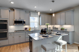 Photo for 12292 62nd Street NE, Otsego, MN 55301 - Listing #6112849 This kitchen features granite kitchen countertops, a walk-in pantry, signature kitchen with double ovens and a gas cooktop, stainless appliances and more! *pictures are of model home, actual colors may vary.
