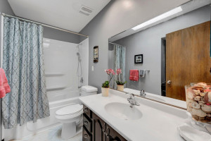 Photo for 5305 72nd Circle N, Brooklyn Park, MN 55429 - Listing #6114047 The Full Bath has Updated Colors, Newly Refinished 12-Inch Tile Flooring, Updated Lighting, Faucet and Shower Head and a Deep Circulating Soaking Tub.