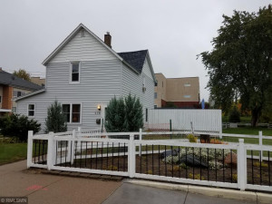 Photo for 636 22nd Avenue NE, Minneapolis, MN 55418 - Listing #6137416 Behind white fence is the above ground pool