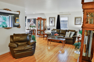 Photo for 2600 Xylon Avenue S, MN 55426 - Listing #6140470 Main level family room & dining area - previous residence furnishings