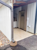 Photo for 90917 240th Street, Austin, MN 55912 - Listing #6176986 Service door from shop area into kennel space.