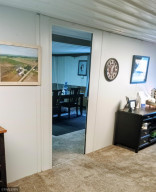 Photo for 90917 240th Street, Austin, MN 55912 - Listing #6176986 These divider walls are only temporary walls that can easily be removed if you prefer toopen the space back up!