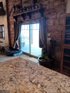 Photo for 90917 240th Street, Austin, MN 55912 - Listing #6176986 Patio doors going out to that amazing patio - this building is made for entertaining - as you'll see!