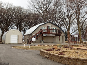 Photo for 90917 240th Street, Austin, MN 55912 - Listing #6176986 Full front view of office space and green house is the building to the left.