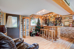 Photo for 7812 29th Street N, Oakdale, MN 55128 - Listing #6193596 This family room is filled with personality and an 'up north' feel. Nope, the logs on the walls aren't real - it's wallpaper. How fun!