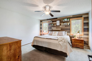 Photo for 7812 29th Street N, Oakdale, MN 55128 - Listing #6193596 Custom wood wall in the main bedroom, suitable for a 'headboard' for this King-sized bed.