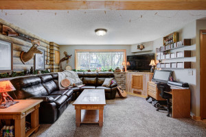 Photo for 7812 29th Street N, Oakdale, MN 55128 - Listing #6193596 Last view of the lower level family room. So much room here - that couch is massive. Time for movie night, or the big game!