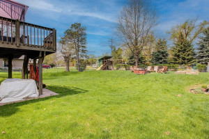 Photo for 7812 29th Street N, Oakdale, MN 55128 - Listing #6193596 This back yard has great zoning, with areas for a bonfire and chairs, play area, and open space. And there's a ton of room under the deck for storage, or another area for dining or play.