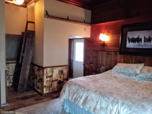 Photo for 90917 240th Street, Austin, MN 55912 - Listing #6176986 Guest entrance to deck on this side and up the ladder is a small loft where small kids really love to sleep!