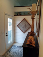 Photo for 90917 240th Street, Austin, MN 55912 - Listing #6176986 Left-Side entrance to main house. Allows you access to guest bath & laundry or master suite private laundry area.