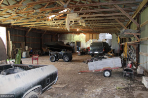Photo for 8342 70th Street SE, Eyota, MN 55934 - Listing #6192906 Inside of shed connected to heated shop. Could be finished for a larger shop or used for storage.
