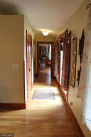 Photo for 8342 70th Street SE, Eyota, MN 55934 - Listing #6192906 Hall from Family Room to Dining with Patio Doors and Storage Closets