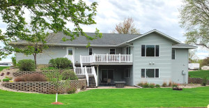 Photo for 714 5th Street NW, Richmond, MN 56368 - Listing #6199191 Spacious deck off of Sun Room overlooking backyard. Access lower patio by upper deck or patio doors from lower level. 90 feet of quality 4 foot retaining wall throughout property.