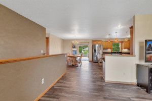 Photo for 714 5th Street NW, Richmond, MN 56368 - Listing #6199191 View from front entry to kitchen, dining area and 4 season sun room.