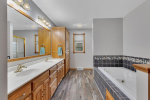 Photo for 714 5th Street NW, Richmond, MN 56368 - Listing #6199191 Spacious main level bathroom situated off dining room and between two bedrooms. Large whirlpool tub with separate shower.