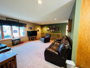 Photo for 810 4th Avenue SW, Plainview, MN 55964 - Listing #6219431 Main floor Family Room with 2nd stairwell to the lower level.