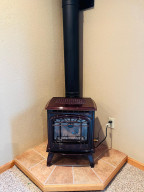 Photo for 810 4th Avenue SW, Plainview, MN 55964 - Listing #6219431 Free standing stove in family room/game room.