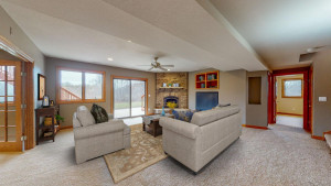 Photo for 4491 Hadley Valley Road NE, Rochester, MN 55906 - Listing #6198490 cozy inviting family room off lower level with sliding doors to patio