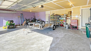 Photo for 1015 166th Street, Hammond, WI - Listing #6222408 Huge 3 car garage with ample storage, recently drywalled and waiting for any finishing touches the new homeowner would like to put into place.