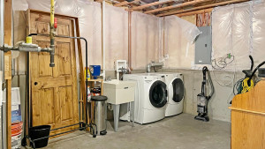 Photo for 1015 166th Street, Hammond, WI - Listing #6222408 Lower level utility room with washer, dryer and additional storage space.