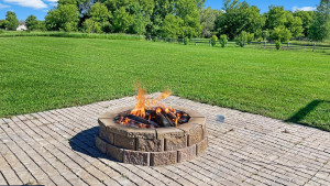 Photo for 1015 166th Street, Hammond, WI - Listing #6222408 The fire pit with brick patio area is perfect for summer evenings and roasting marshmallows.