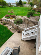 Photo for 714 5th Street NW, Richmond, MN 56368 - Listing #6199191 View of the exposed aggregate patio from upper deck.