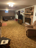 Photo for 15784 County 23, Verndale, MN 56481 - Listing #6158604 Brick Fireplace in Lower Level Family Room
