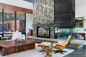 Photo for Bovey, MN 55709 - Listing #5497223 A custom-color, gas fireplace highlights the main living room, along with stone, skylights and wood inlays.