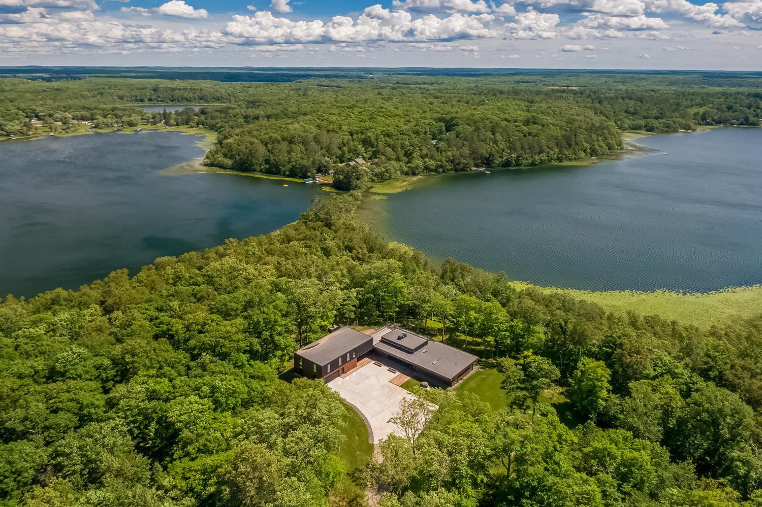 Photo for Bovey, MN 55709 - Listing #5497223 A unique, yet very practical build surrounded by mature hardwoods and shoreline.