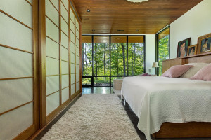 Photo for Bovey, MN 55709 - Listing #5497223 Shoji screen doors accent the closet of this master bedroom with more epic views of the outdoors.