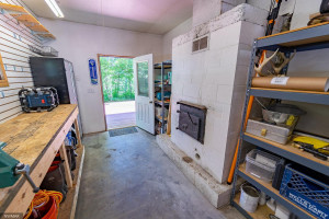 Photo for 3615 Riverside Drive NE, Bemidji, MN 56601 - Listing #5629718 Garage Workshop with Rear Loading Fireplace