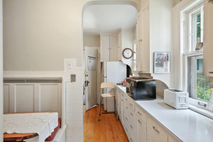 Photo for 1484 Summit Avenue, Saint Paul, MN 55105 - Listing #5651850 The main floor kitchen is bright with all white cabinets and countertops. 1484 Summit Avenue, St. Paul, MN.