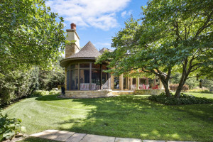Photo for 3960 Walden Shores Road, Wayzata, MN 55391 - Listing #5641066 another view of 3 season porch with grill and fireplace.