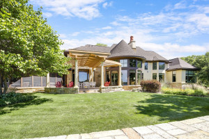Photo for 3960 Walden Shores Road, Wayzata, MN 55391 - Listing #5641066 view of back of the house of patio, 3 season porch and living room