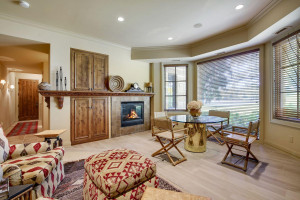 Photo for 3960 Walden Shores Road, Wayzata, MN 55391 - Listing #5641066 view of firplace in lower level fam room and view out to the water.