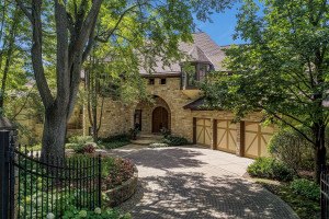 Photo for 3960 Walden Shores Road, Wayzata, MN 55391 - Listing #5641066 view from entry gate the stone on front of home