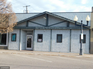 Photo for 207 4th Street NW, Bemidji, MN 56601 - Listing #5679134 Stucco Building with on street parking in front