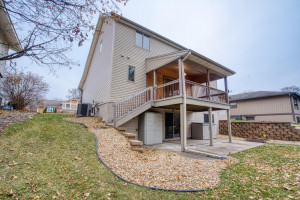 Photo for 2159 Erin Court, New Brighton, MN 55112 - Listing #5691861 Professional Landscaping. Inground Sprinklers under Kentucky Blue Grass, a covered Cement Patio & beautiful Block Retaining Walls.
