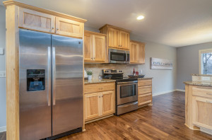 Photo for 2159 Erin Court, New Brighton, MN 55112 - Listing #5691861 High end touches throughout: stainless steel appliances, custom hickory cabinetry, tumbled Roman tile back-splash and granite counter tops.