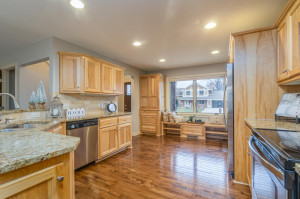 Photo for 2159 Erin Court, New Brighton, MN 55112 - Listing #5691861 Granite countertops, tumbled Roman tile back splash, custom hickory cabinetry & rich hardwood floors.
