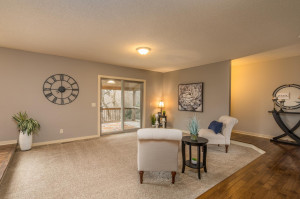Photo for 2159 Erin Court, New Brighton, MN 55112 - Listing #5691861 Hardwood floors add warmth to the living room. Step right outside to the covered deck.