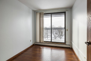 Photo for 2601 Kenzie Terrace, 521, Saint Anthony, MN 55418 - Listing #5699574 2nd bedroom or den/office has sliding glass doors to double balcony