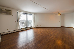 Photo for 2601 Kenzie Terrace, 521, Saint Anthony, MN 55418 - Listing #5699574 Huge living room with sliding glass doors to the balcony