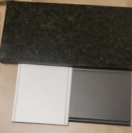 Photo for 30692 Arapaho Circle, Breezy Point, MN 56472 - Listing #5686296 Kitchen cabinet colors for the home under construction: White cabinets, gray center island and black granite.