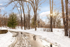 Photo for 835 Hunt Farm Road, Long Lake, MN 55356 - Listing #5693151 A fairytale setting complete with a winding entrance and cobblestone driveway through mature trees.